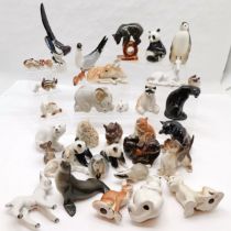 Collection of Russian Lomonosov pottery animals to include, Magpie, kneeling elephant, black