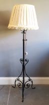 Vintage wrought iron standard lamp, with shade, 166 cm high to include shade.