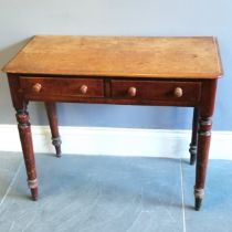 Victorian mahogany side table with 2 short frieze drawers on turned supports, heavily water