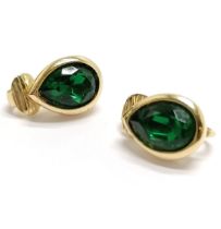 Christian Dior pair of gold tone earrings set with green stone - SOLD ON BEHALF OF THE NEW BREAST