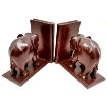 Pair of African hardwood elephant bookends, with painted details, 19 cm wide, 17.5 cm high. good