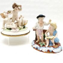 Capo Di Monte Figural group of playing Putti - 16cm high x 15cm wide & has some minor losses t/w