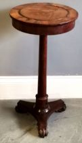 Antique Rosewood plant stand, on turned circular column terminating tripod base, water damage &