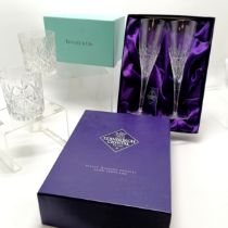 Pair of Edinburgh crystal champagne flutes (23cm) in original fitted box t/w pair of moulded crystal