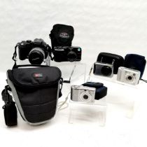 Fujifilm Finepix digital camera, canon power shot digital camera, 3 others, not tested.