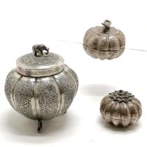3 x oriental metal lidded boxes largest 11cm high with 3 fish shaped feet and an elephant finial all