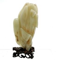 Hand carved oriental Chinese jade flower head on hand carved wooden base (14cm total height) -