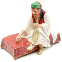 Studio Pottery figure by Reg Johnson of an Albanian Dice Thrower 15.5 cm high & no obvious