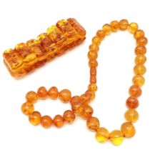 Strand of graduated amber beads (48cm) t/w amber panel expandable bracelet (3cm wide) ~ total weight