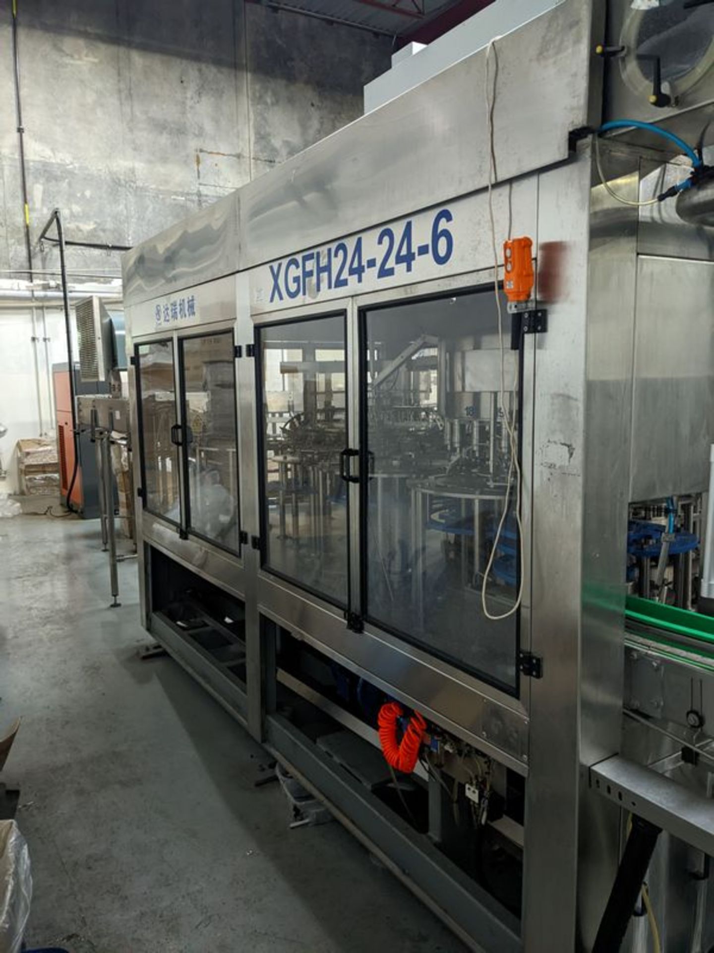 D-Real XGFH-24-24-6 - 24 Head Bottle Filling Capping Machine with Cap Loader