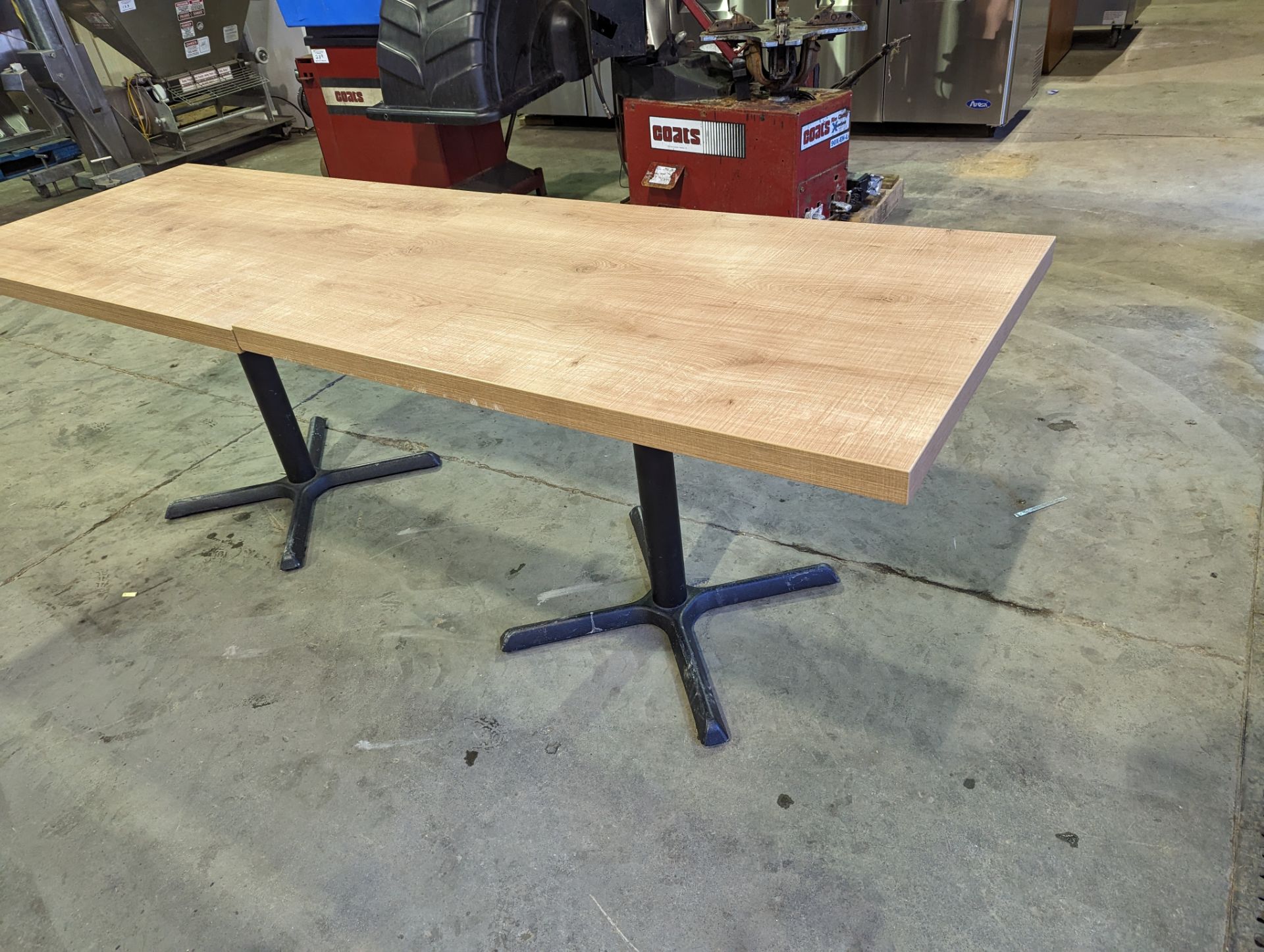 Two 47 x 30" Single Pedestal Custom Rough Wood Top Tables