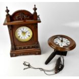 FATTORINI & SONS, BRADFORD; an early 19th century oak cased eight day mantel clock with automatic