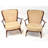 LUCIEN RANDOLPH ERCOLANI FOR ERCOL; a pair of 'Windsor' stick back lounge chairs (2).Qty: 2