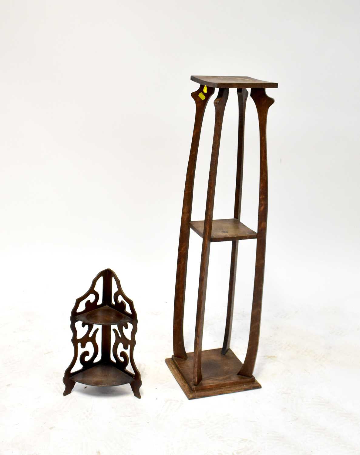 An oak Art Nouveau style plant stand, height 109cm, together with a small two-shelf corner shelf