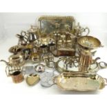 A quantity of silver plated items to include tea sets, tray, cigarette case, cigarette box,