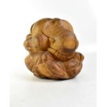 A large Javanese carved wood Orang Malu.Condition Report; height 32cm