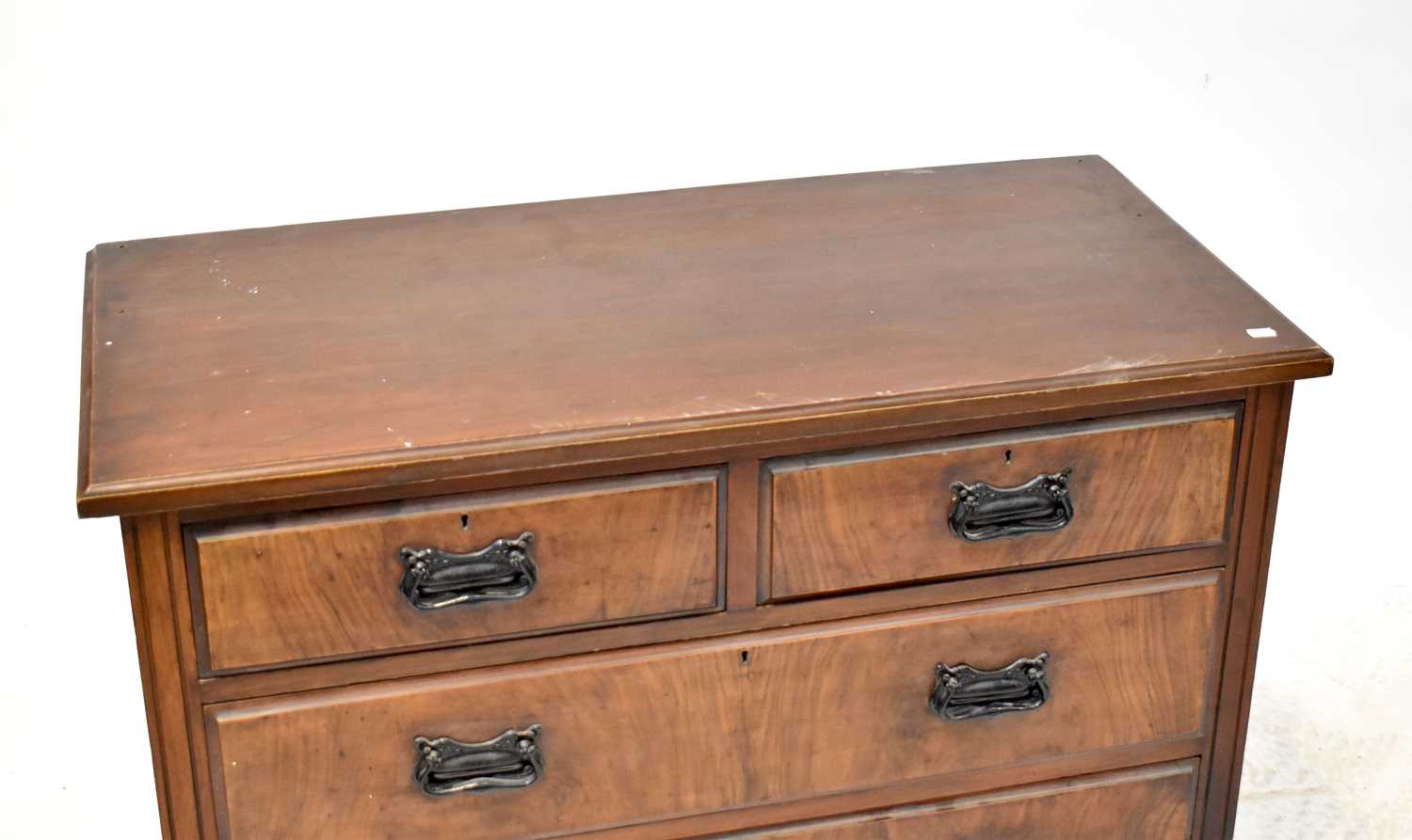 An early 20th century walnut chest of two short over two long drawers, raised on turned supports, - Image 2 of 6