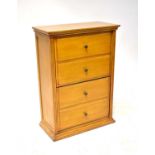 A 20th century narrow four-drawer chest of drawers to plinth support, 92 x 66 x 33cm.92 x 66 x 33cm