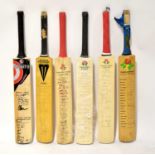 Six Lancashire County Cricket Club bats with various players' names on and England players' names,