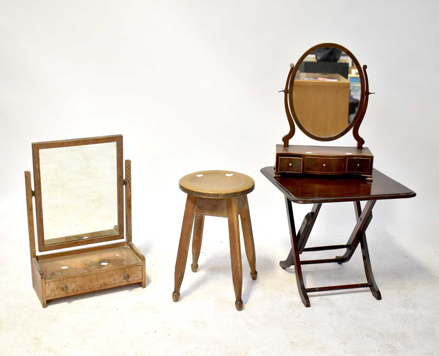 A reproduction mahogany folding table, 53 x 53 x 53cm, an oak stool with outswept supports and two