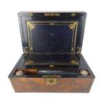 A 19th century burr walnut veneered writing slope with brass inset border and central square blank