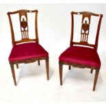 Five early 20th century mahogany splat back dining chairs with wheatsheaf decoration to the top