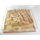 An Architect's cased street plan model, with streets, houses, office buildings, ecclesiastical