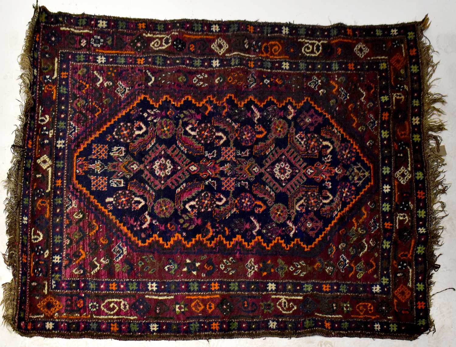 An Iranian Kashgai blue ground hand knotted rug, 192 x 143cm.192 x 143cm