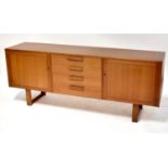 VANSON; a 1960s teak sideboard comprising a central bank of four drawers flanked by two locking