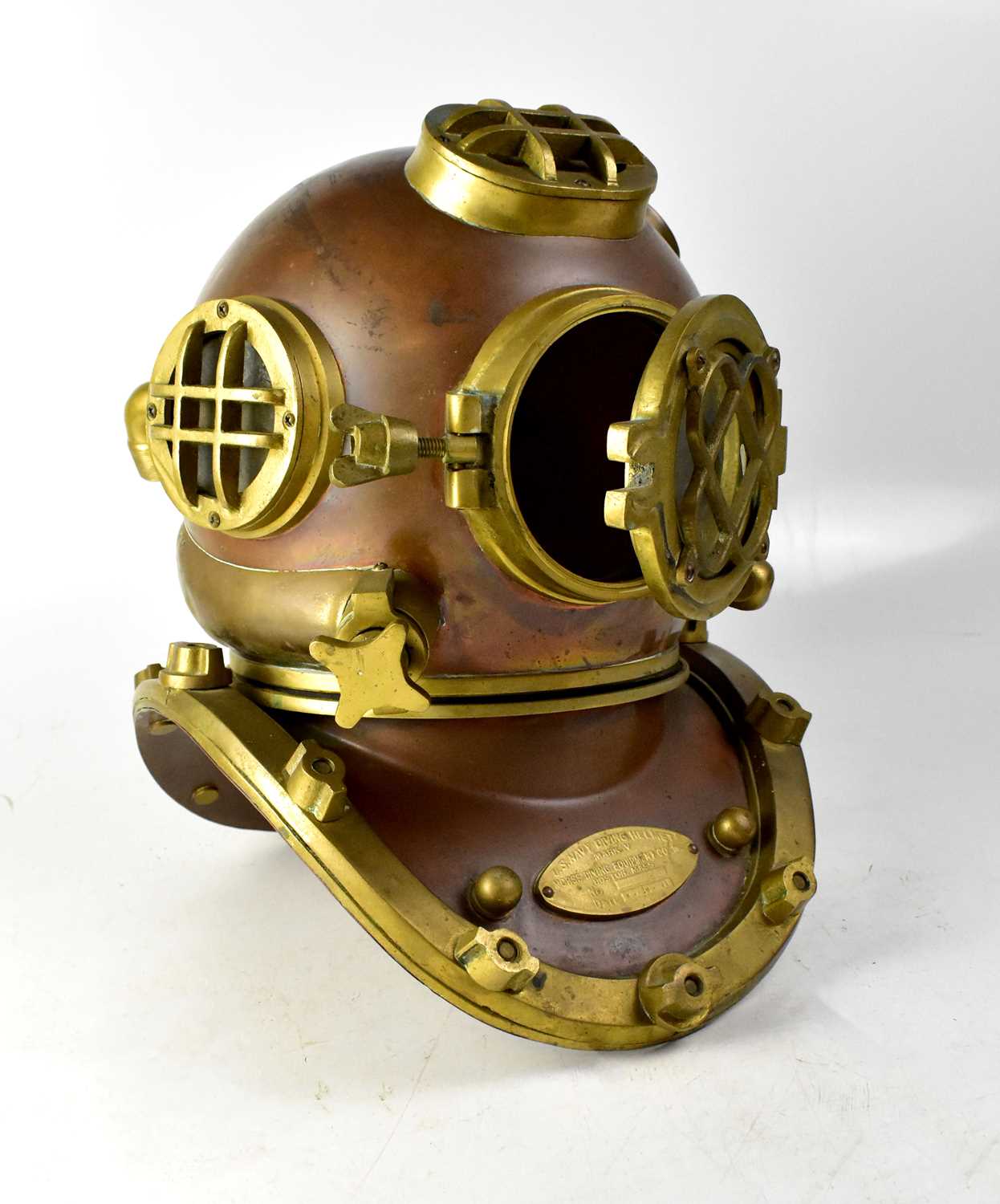 A copy brass and copper US Navy diving helmet Mk IV.