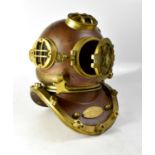 A copy brass and copper US Navy diving helmet Mk IV.