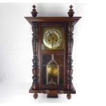 An early 20th century mahogany regulator wall clock, length approx. 77cm.Length approx. 77cmPlease