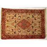 An Afghan Beluch mauve ground hand knotted rug, 154 x 95cm.154 x 95cm