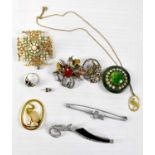 A quantity of jewellery to include a sterling silver ring and earrings, brooches, etc.