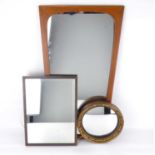 A G-Plan style teak wall mirror of tapered form, length 70cm, together with a rectangular bevel edge