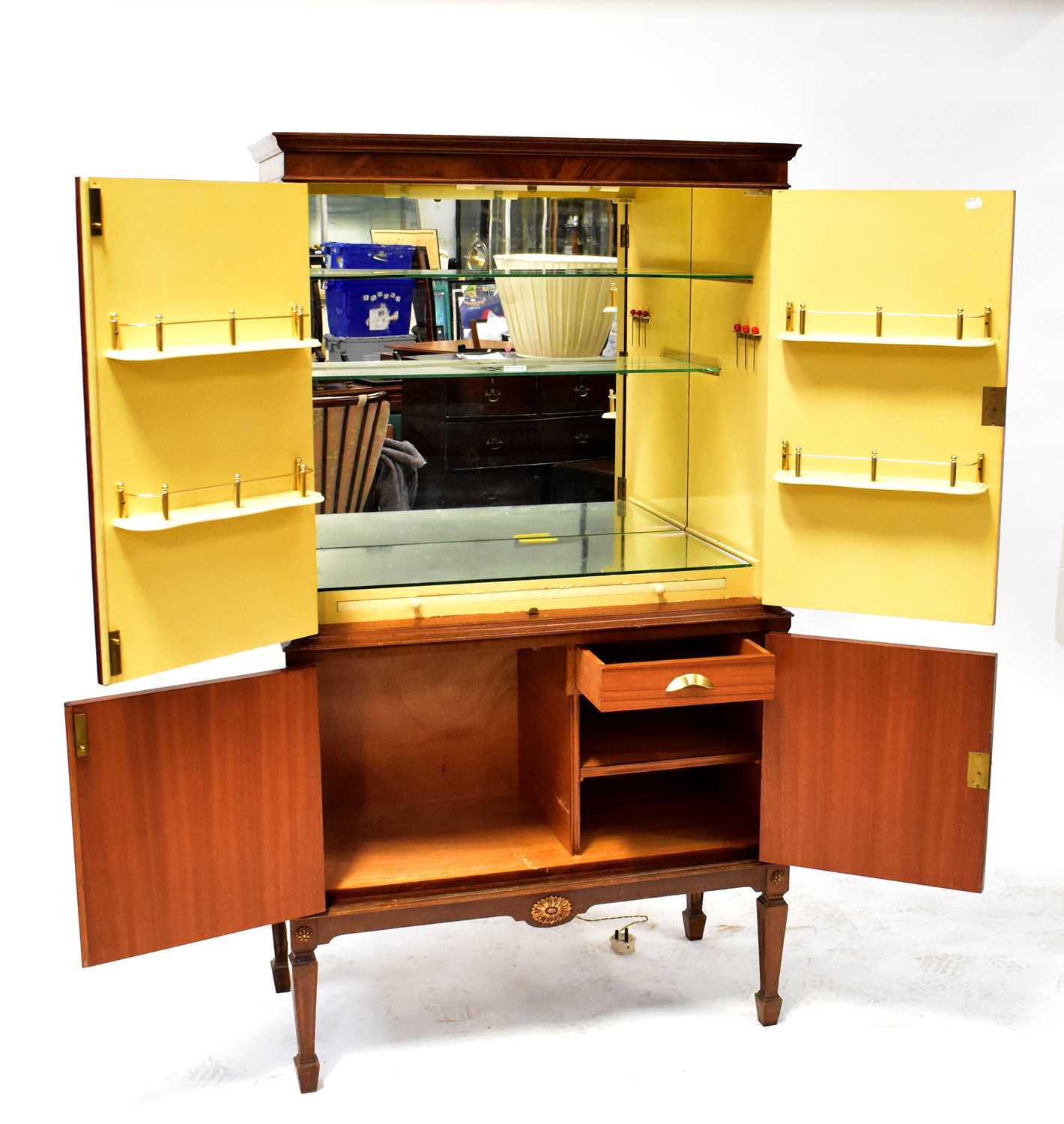 A Regency-style mahogany cabinet opening to reveal a cocktail cabinet fitted with shelves and - Image 2 of 2