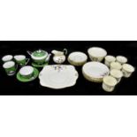 A Tuscan bone china six setting tea service and a Czechoslovakian Art Deco style part tea service.