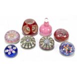 MURANO; a contemporary faceted glass paperweight, with internal millefiori, diameter 8cm, together