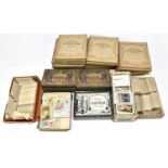 An extensive collection of assorted cigarette cards contained in various boxes and albums, to