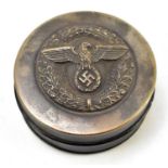 A 19th century metal and papier-mâché snuff box of circular form with later applied Third Reich