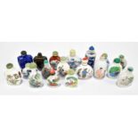 A collection of modern Chinese porcelain and ceramic snuff bottles to include Famille Rose and