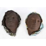 STAATLICHE KARLSRUHE; a pair of Art Deco style wall masks representing maiden’s head with headdress,