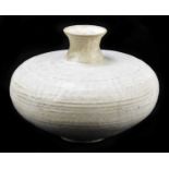 BOOZE GOODMAN; a coiled Studio Pottery vase with a white glaze, incised marks, height 23cm.