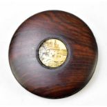 A 19th century rosewood snuff box of circular form with ivory panel, decorated with Lancaster