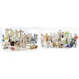 A collection of 19th century and later Continental and English ceramic figures, candelabra and