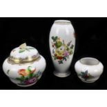 HEREND; a hand painted porcelain lidded jar of bulbous form with floral encrusted detail to the