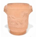 A 19th century terracotta ice bucket in the manner of Davenport with grotesque mask head and