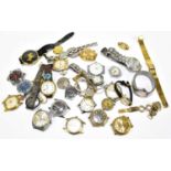 A large collection of gentleman's and lady's wristwatches, movements and parts, various