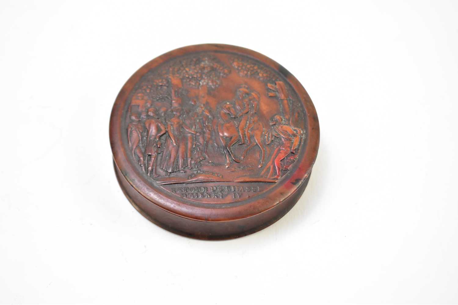 A 19th century French burr wood snuff box of circular form embossed with figures on horseback, - Image 3 of 5
