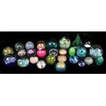 A collection of twenty six assorted paperweights, twenty four examples being glass, various
